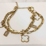 Elegant Multi-Layered Gold Charm Bracelet with Clover & Crystal Accents
